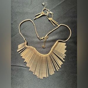 Gold tone necklace and earrings.
